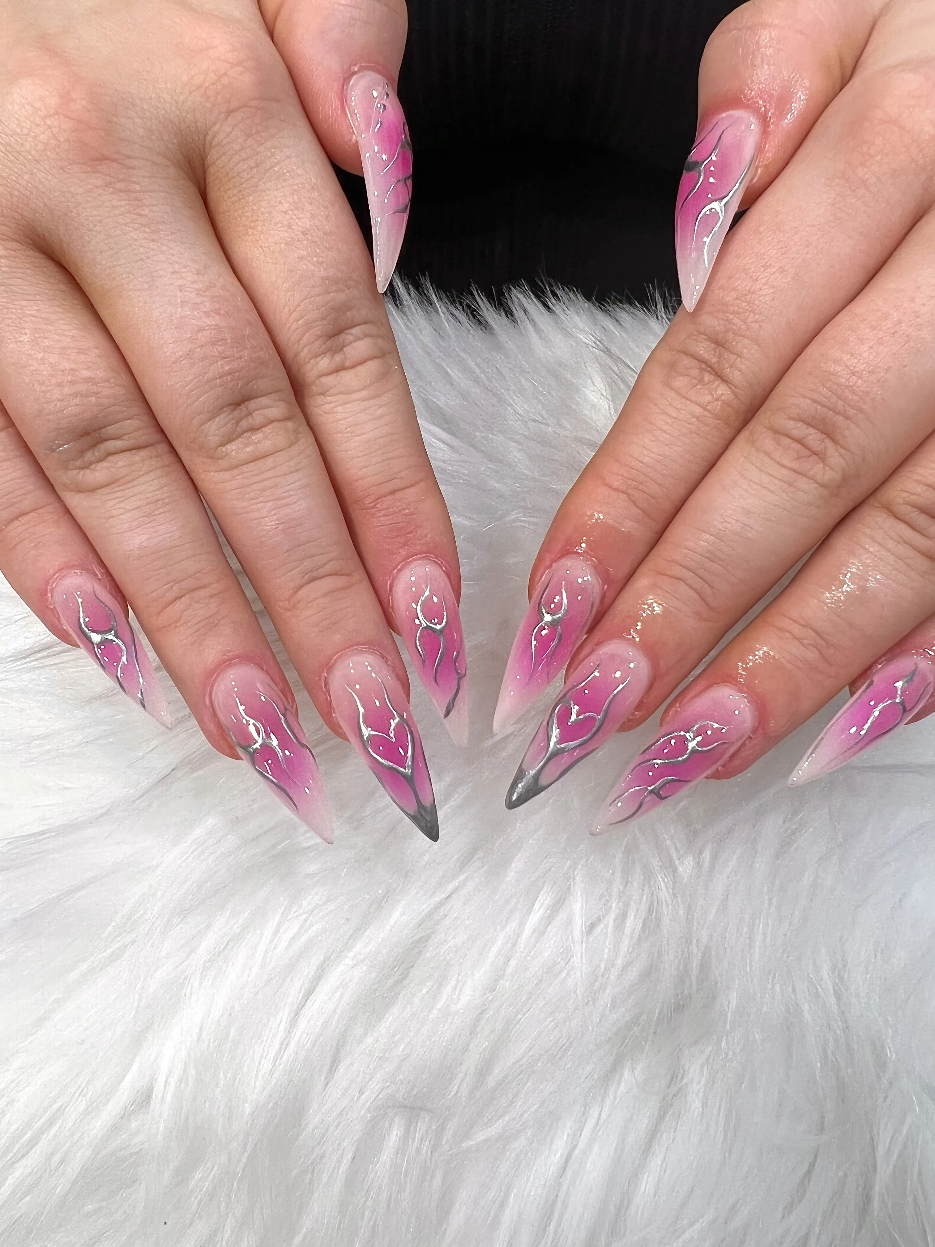 Pink ombre stiletto nails with silver chrome flame art